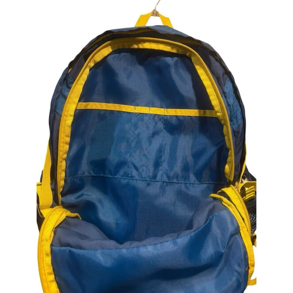 JanSport Raney 32 Hiking Travel Backpack blue/yellow